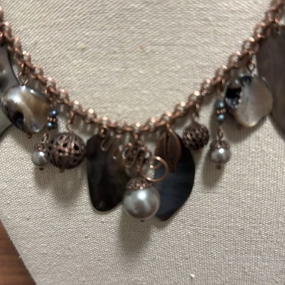 Lia Sophia Signed Bronze necklace with Abalone, Fresh Water Pearls and Charms.